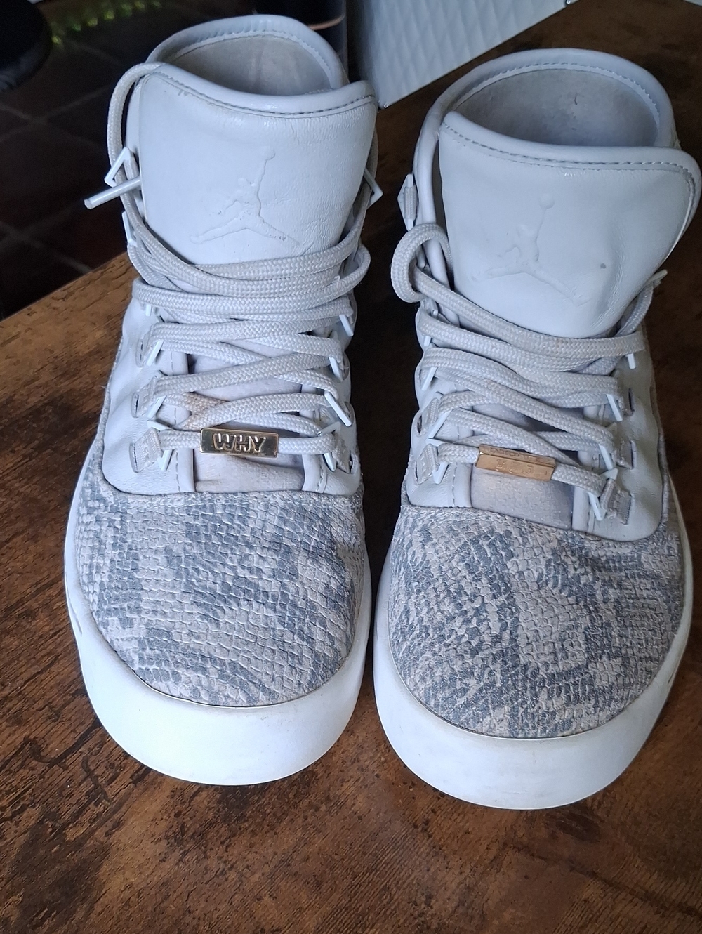 Jordan High Top Sneakers in Light Gray with Snake-Texture Toe
